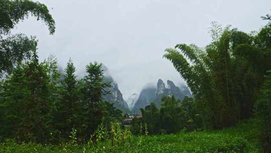 农村下雨雨景远山云雾雨季小雨