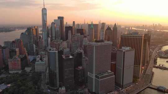航拍纽约曼哈顿市中心摩天大楼哈德逊河日出视频素材模板下载