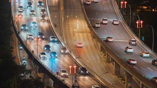 城市夜景街头马路行驶的汽车与车流