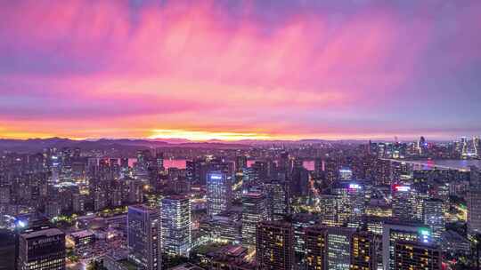 绝美晚霞火烧云中的杭州滨江区城市夜景