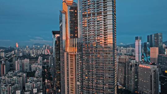 航拍深圳东海国际公寓傍晚夕阳镜头视频素材模板下载