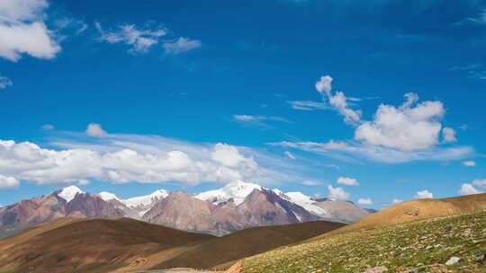 西藏拉萨甲岗雪山延时蓝天白云空境4k