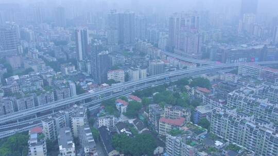 广州城市密集建筑景观与下雨天气风光航拍