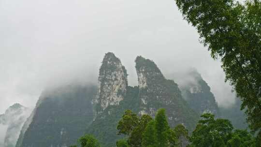 农村下雨雨景远山云雾雨季小雨