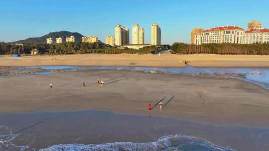 航拍日出的福建漳州东山岛金銮湾海岸线风光