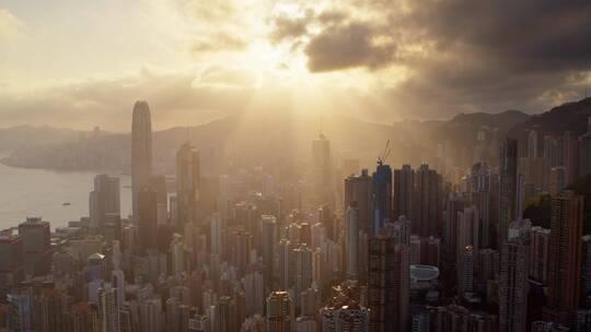 香港航拍城市大景日出丁达尔光