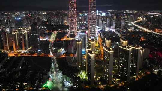 云南万达昆明双塔夜景西山区航拍延时城市地