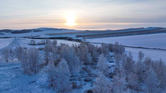 远山丘陵雪野雾凇夕阳