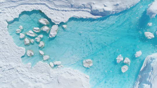 南极洲冰山绿松石融化孔鸟瞰图视频素材模板下载