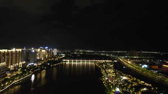 航拍福建漳州城市夜景灯光交通