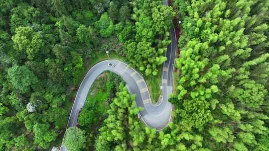 航拍汽车行驶在盘山公路