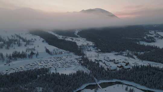 航拍清晨的新疆喀纳斯雪景