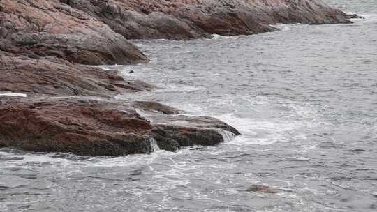 深圳海岸线-大梅沙礁石风起浪涌