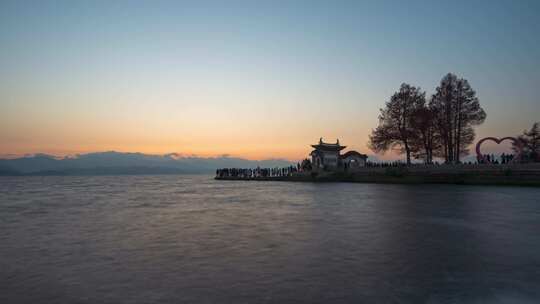 云南大理古城洱海龙龛码头海边日出延时摄影