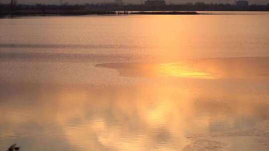 夕阳 日落 晚霞 水面 建筑