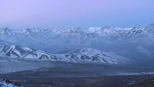 航拍雪山清晨梦幻粉色日出