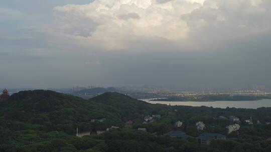 航拍武汉东湖梅园码头山丘白云城镇大远景