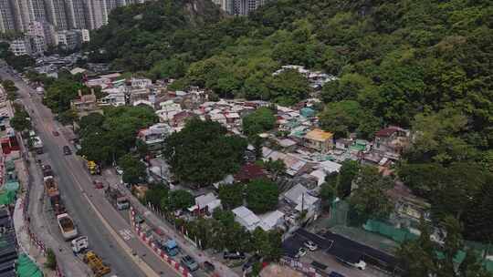 无人驾驶飞机在中国香港茶果岭村上空旋转射击。香港政府提议补救
