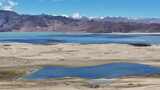 航拍西藏日喀则帕羊镇沙漠湿地高清在线视频素材下载