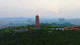 夕阳下的楚雄彝族州中国第一福塔大景航拍高清在线视频素材下载