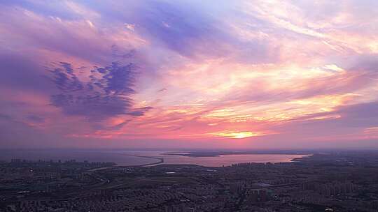 夕阳日落跨海大桥美景粉色日落