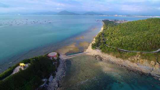 航拍海南三亚西岛海洋文化旅游区海浪礁石