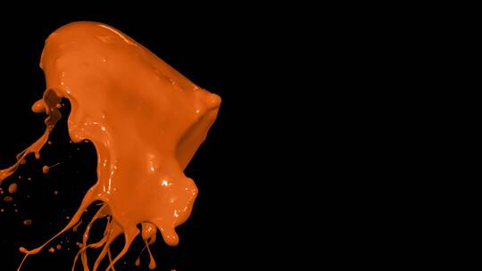 橙色一片液体颜料泼洒下落