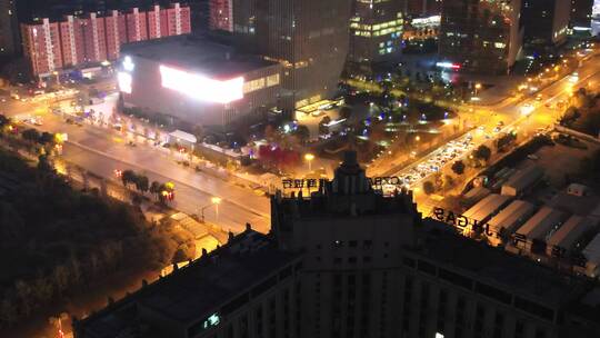 航拍夜晚金华城区道路街道路口交通车流夜景