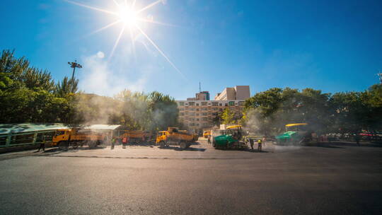 施工队建筑工地铺设沥青柏油马路过程延时视频素材模板下载