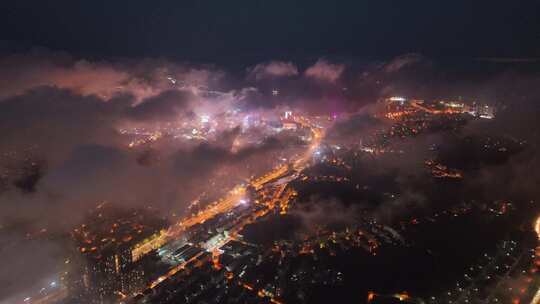 航拍威海市环翠区平流雾幸福门城市夜景