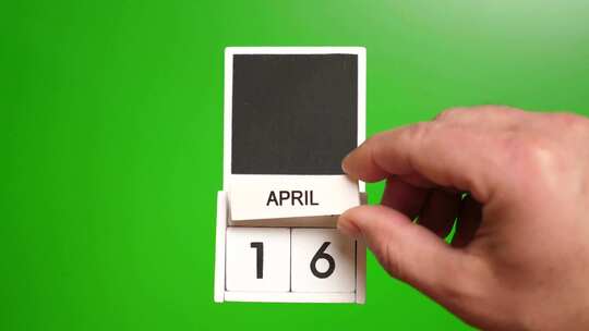 04.绿色背景上日期为4月16日的日历。视频素材模板下载