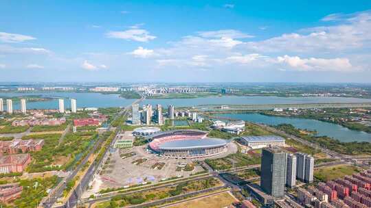 江西南昌艾溪湖奥体中心体育馆蓝天白云延时