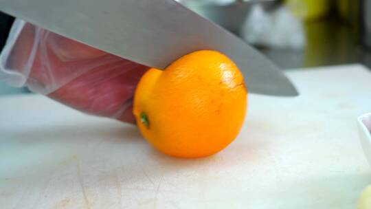 升格实拍美食制作水果用刀切开的橙子