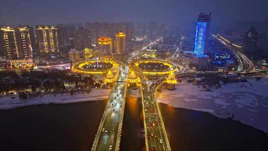 中国黑龙江哈尔滨公路大桥夜晚雪景航拍