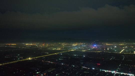 城市航拍洛阳阴雨天后城市云海夜景建筑