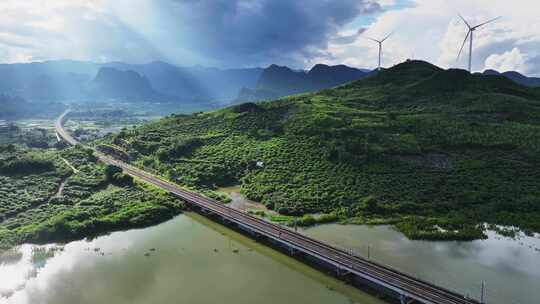 航拍中国高铁驶过山川与乡村