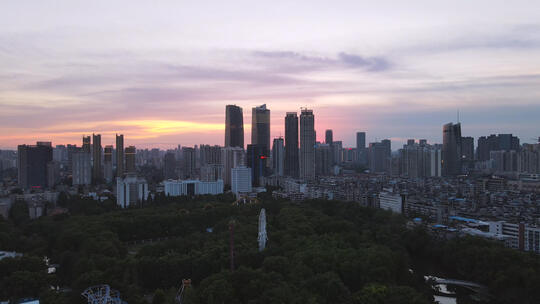 航拍城市天际线高楼群夕阳晚霞落日天空