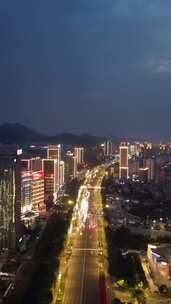 竖版航拍山东济南奥体中心经十路夜景