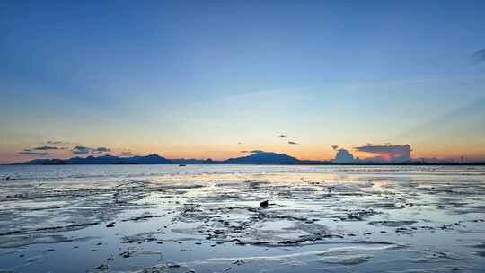 4k航拍日落晚霞后的滩涂海天一色