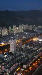 竖屏航拍青海西宁城市蓝调时刻夜景