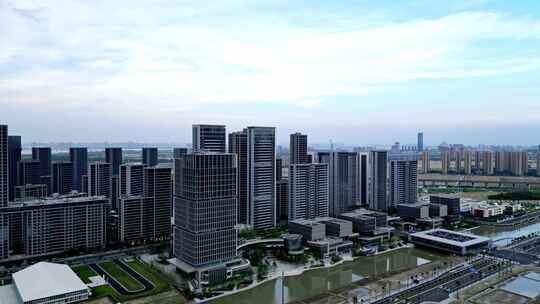 4K航拍蓝天白云下杭州亚运村城市建筑