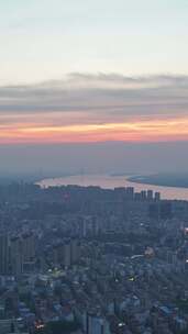 竖屏航拍江西九江城市夕阳晚霞