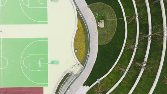 4K航拍俯视上海体育场室外篮球场花坛