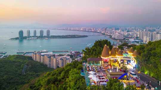 海南三亚三亚湾晚霞航拍晚霞城市夜景延时