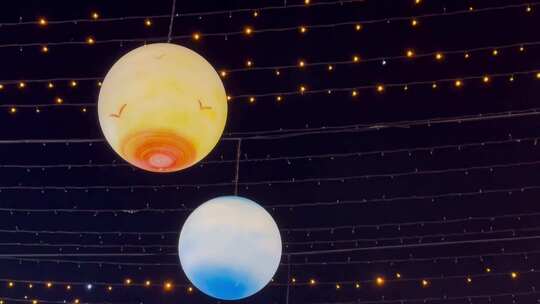 夜景步行街场景美陈灯光亮化行星造型灯视频素材模板下载