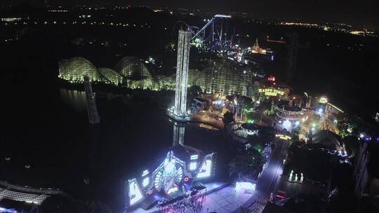航拍上海欢乐谷游乐设施夜景灯光秀