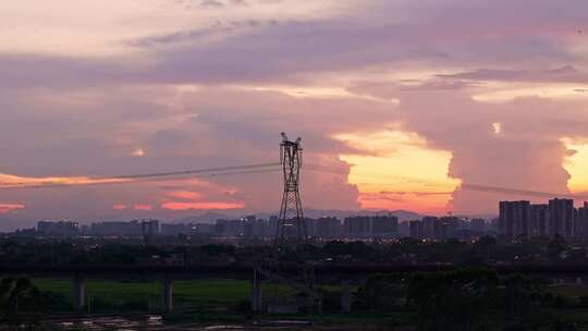 夕阳电塔城市航拍