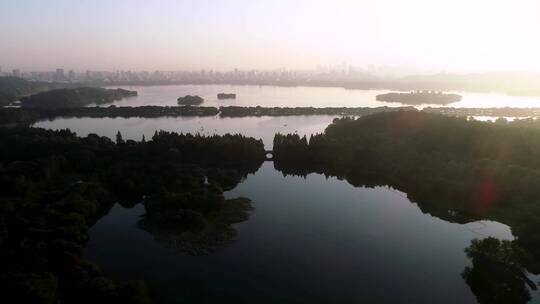 4K航拍杭州西湖早晨太阳照射湖面上视频合集