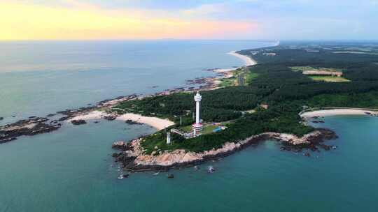 航拍海南省文昌木兰湾航海灯塔日出霞光风景