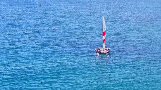 海南三亚海棠湾后海渔村航拍蔚蓝色海岸线